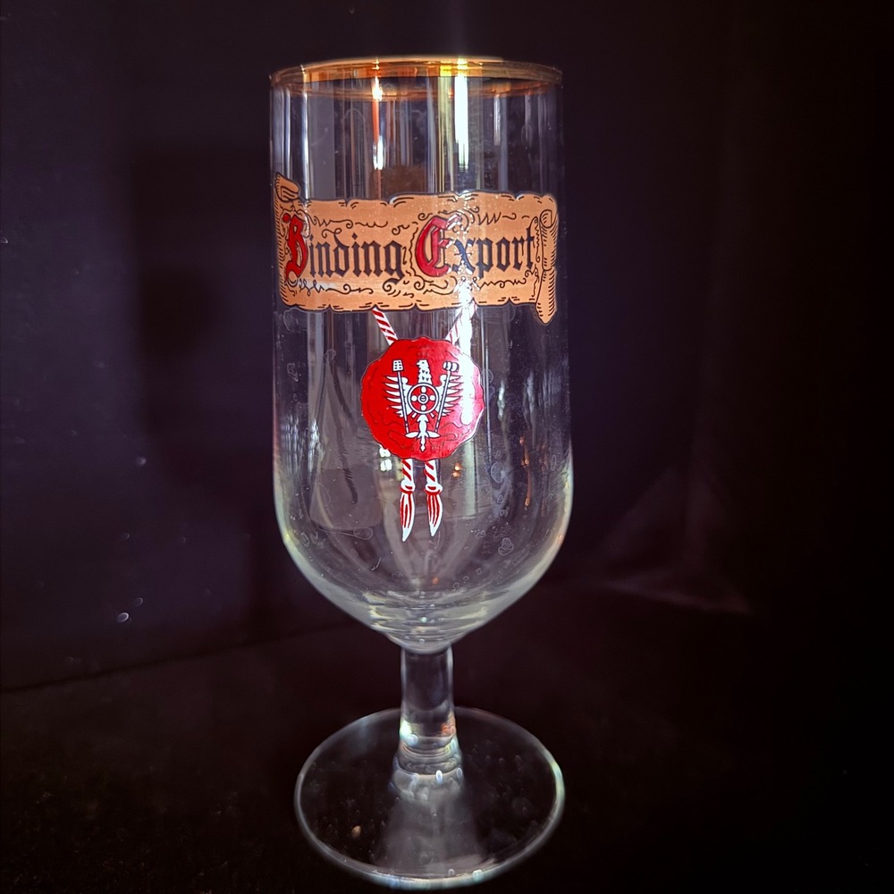 Binding Export Branding Vintage Clear Glass Stemmed beer goblet with gold rim.
